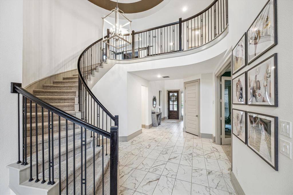 Elegant curved staircase in entry