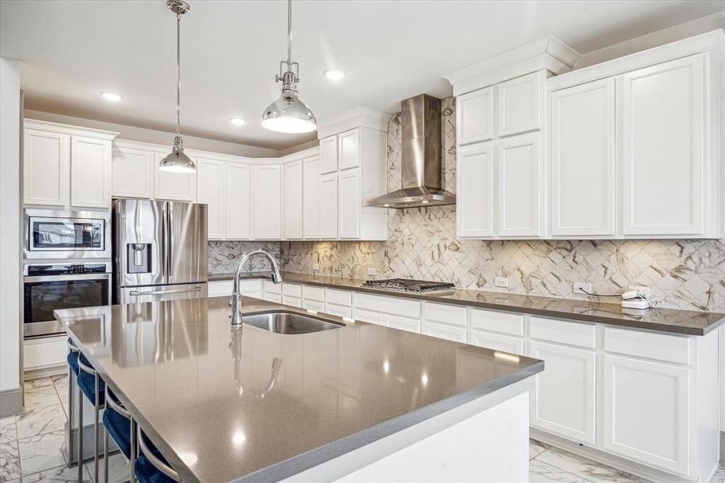 Stunning kitchen with oversized breakfast bar