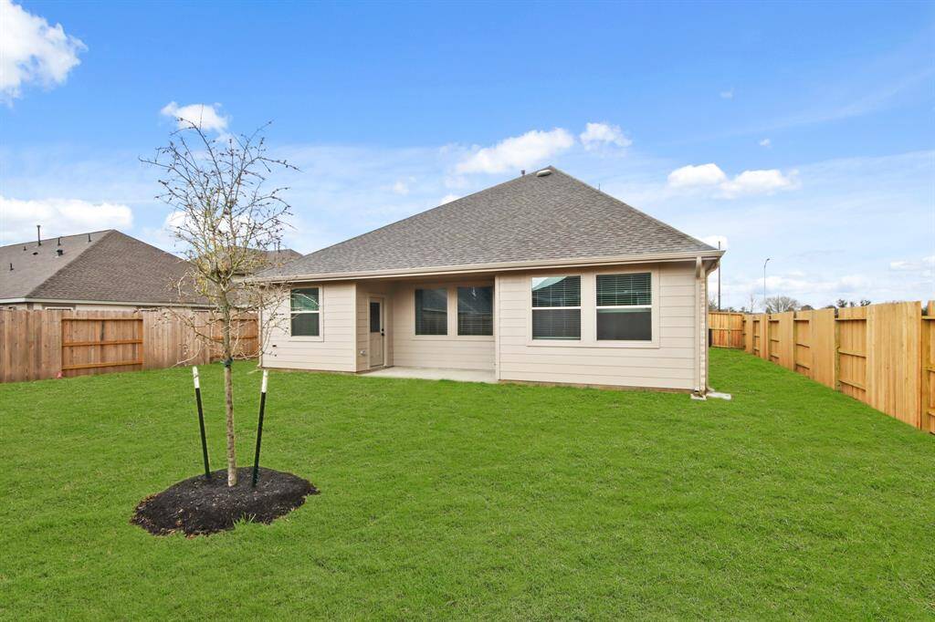 Covered patio overlooking backyard