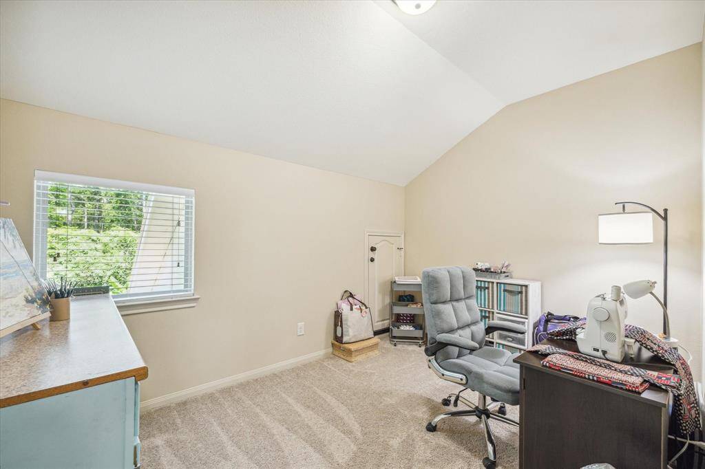 Upstairs carpeted craft room/play room