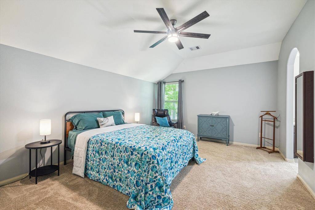 Carpeted and roomy, bedroom #5 shares a jack and jill with bedroom #4