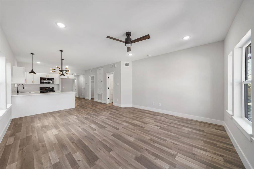 Photos of a different duplex with same layout and similar finishes.