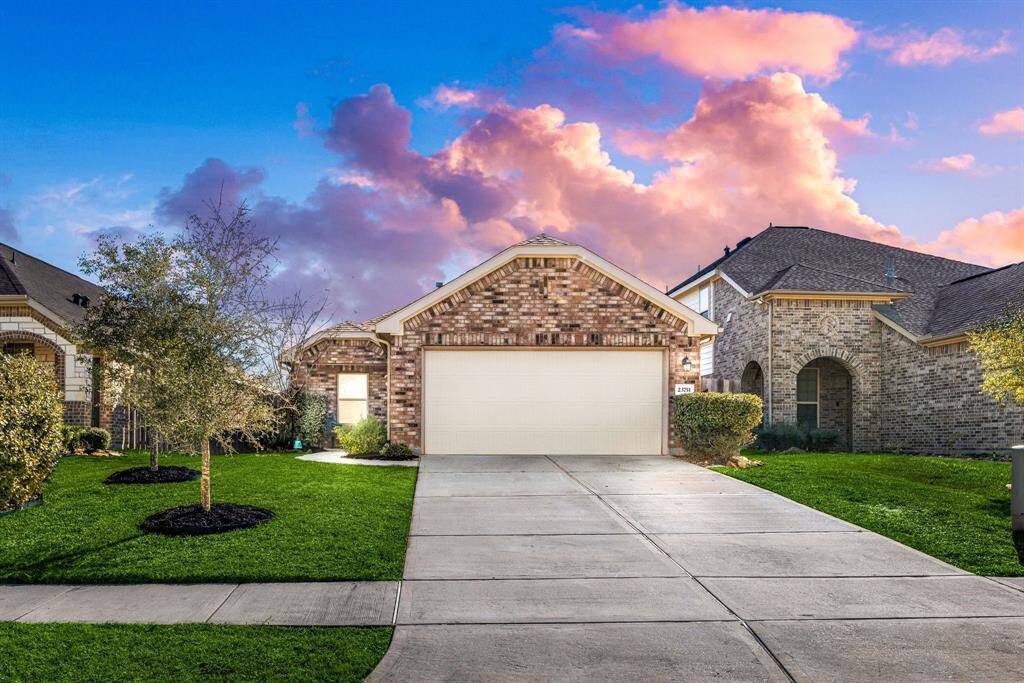 Welcome home to 23751 Via Maria Drive located on a quiet street in Tavola and zoned to New Caney ISD! This stunning home has lovely curb appeal, a well-manicured lawn, beautiful landscaping and a double wide driveway!