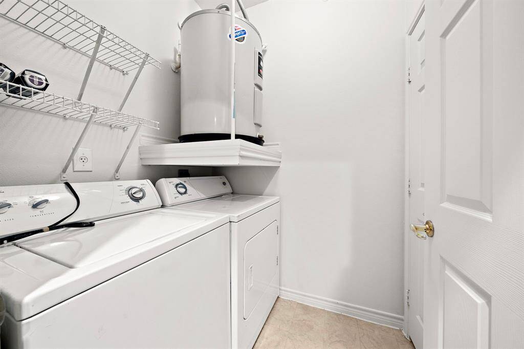 Convenient indoor laundry room.