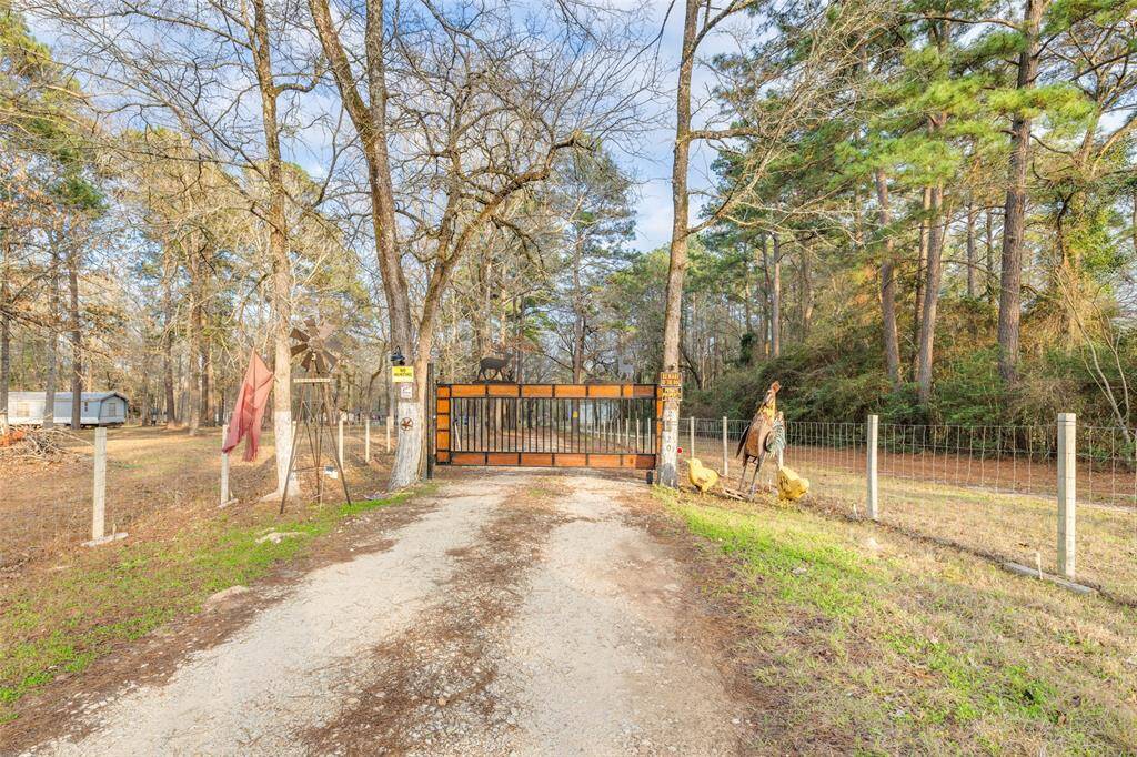 Beautiful grand gated entrance into property and stunning acreage