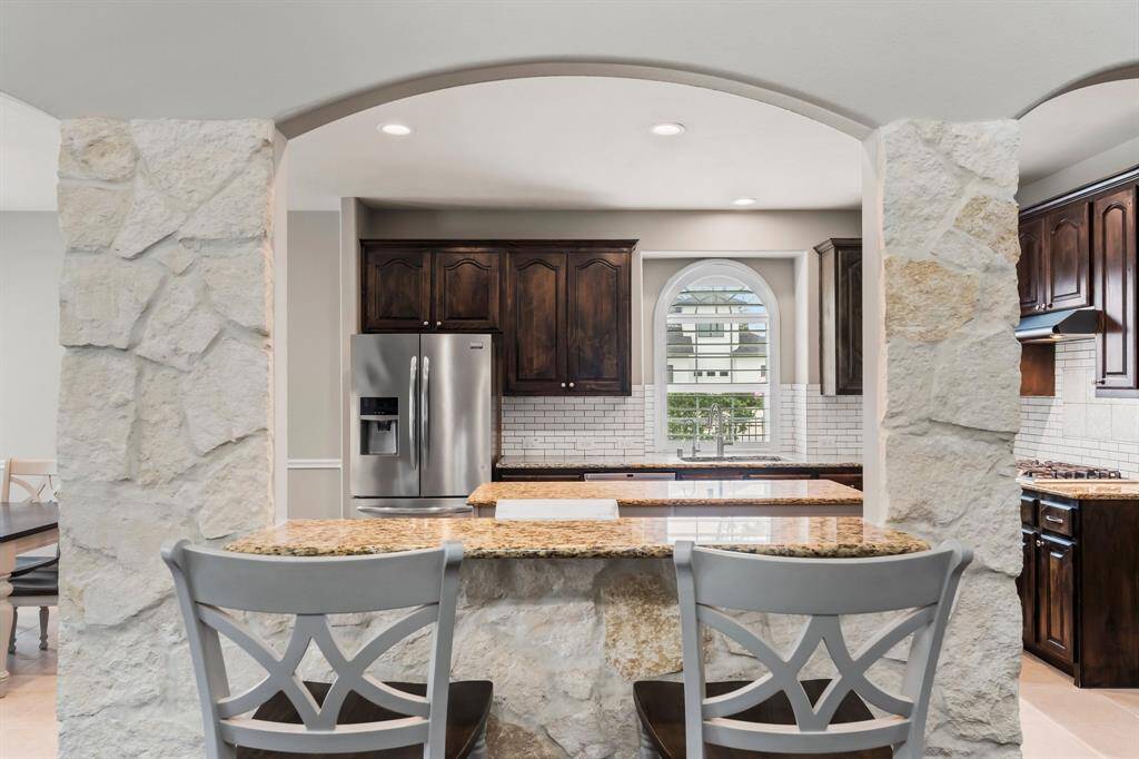 View from the living room to the bar facing the kitchen.