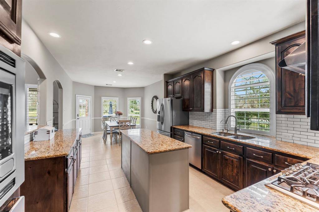 View from the butler's pantry of the kitchen and breakfast room.
