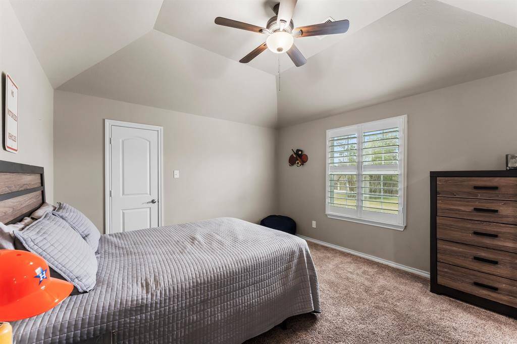 Bedroom 4 also features a large closet and windows facing the side of the home.