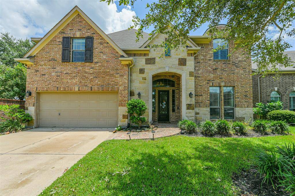 Stunning Two-Story Home with Brick & Stone Elevation