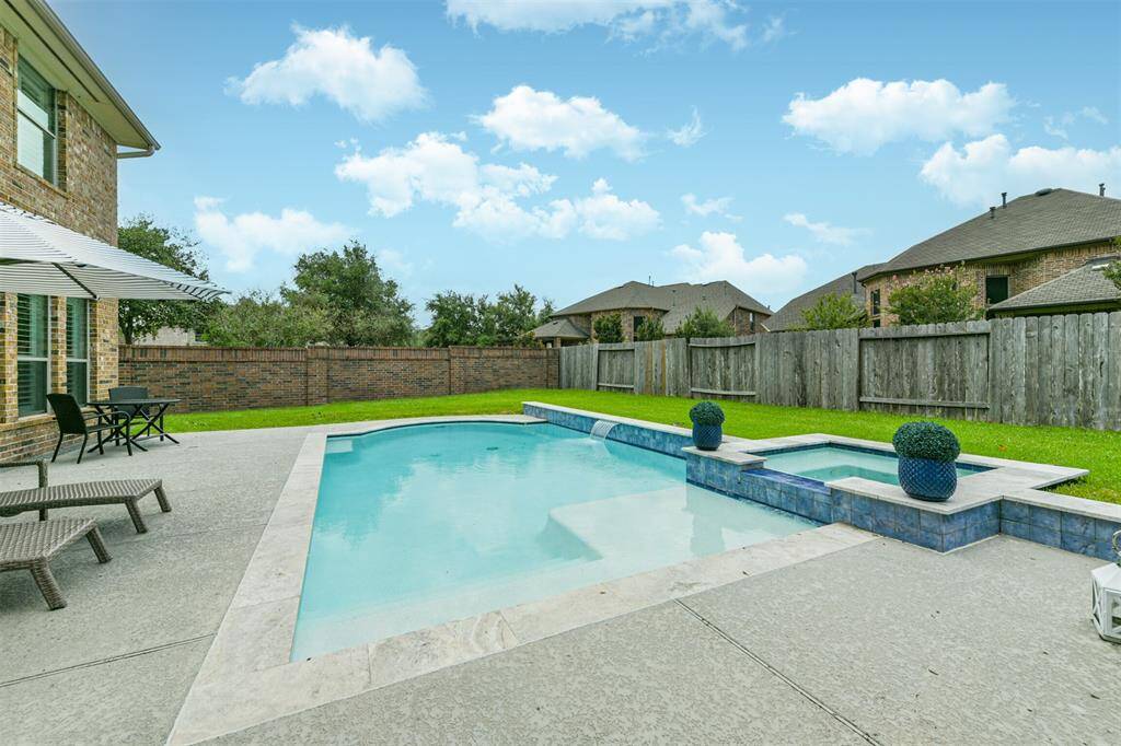 Vacation 365 Days a Year in this Backyard Oasis