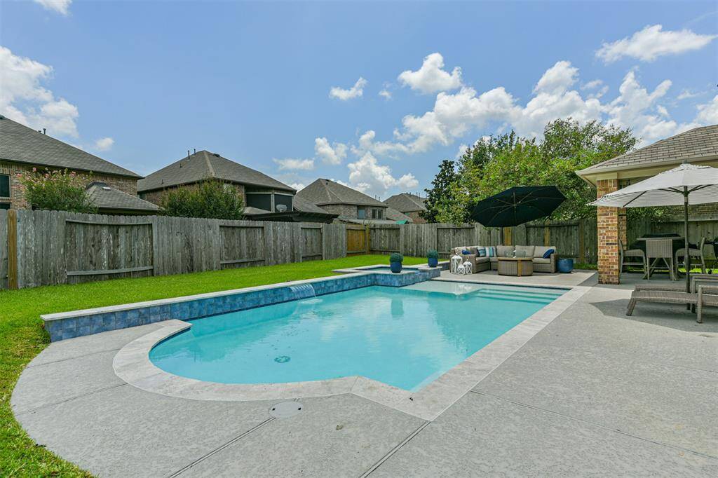 Vacation 365 Days a Year in this Backyard Oasis