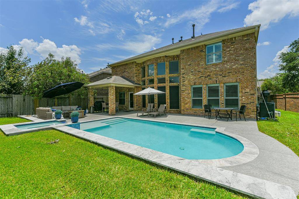 Vacation 365 Days a Year in this Backyard Oasis
