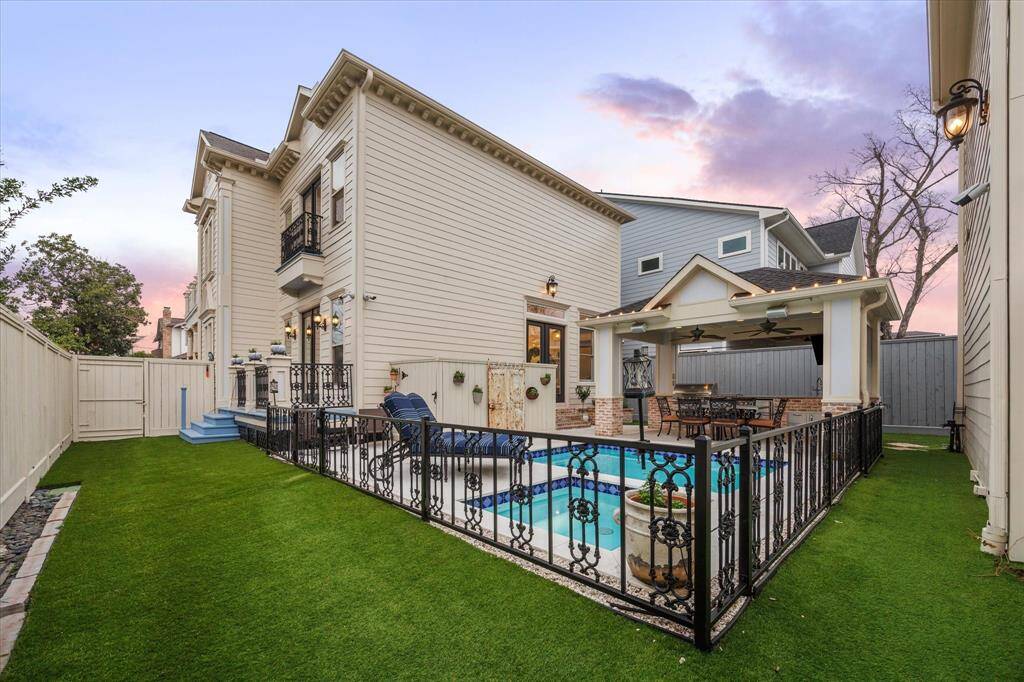 Enjoy a view of the low-maintenance, turfed backyard, perfect for your loved ones to run and play! The property also features a professionally installed exterior camera system with 10 cameras and a DVR recording system.
