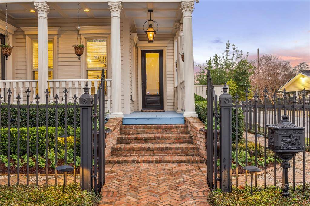 Welcoming front porch with gas lantern to welcome guests.