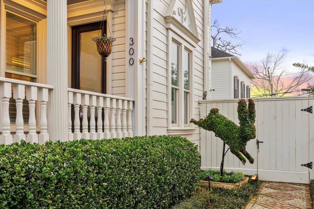 An irrigated bunny topiary enhances the landscaping, adding a charming touch to the yard.