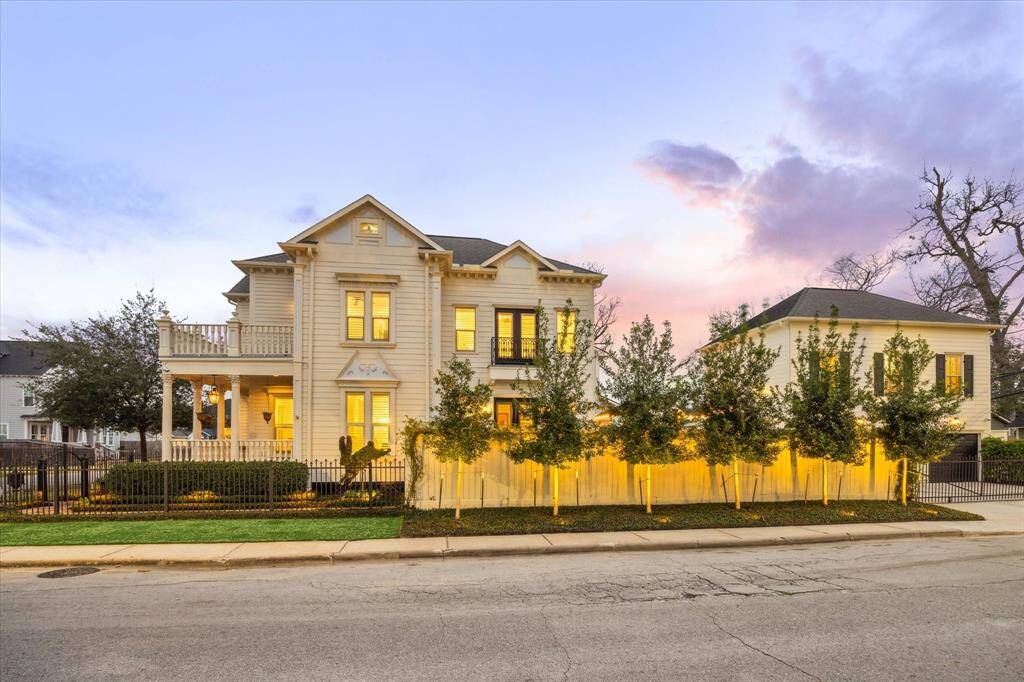 Low-voltage landscape lighting illuminates the yard, creating a beautiful ambiance around the property.