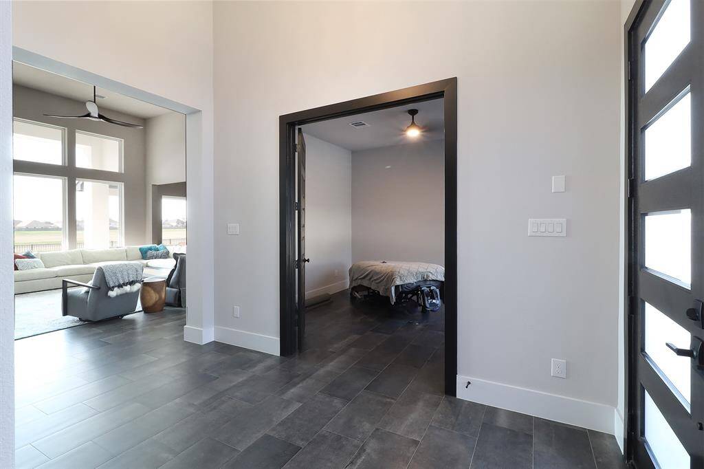 Guest bedroom and bath  just off the foyer.