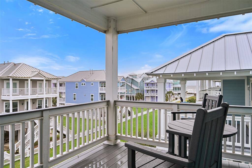 With ample space on the ground floor, entertaining is a "gulf" breeze!  Invite friends and family for outdoor festivities all protected from the sun.  Also notice the outdoor shower and the enclosed storage for all the beach toys.  The double garage doors offer easy access for guests and extra covered parking. Next to the stairs is an ELEVATOR platform (ready for you to instal an elevator).