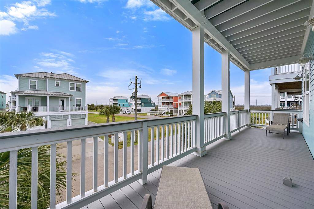 Rock your cares away in the gulf breezes of this gorgeous patio.