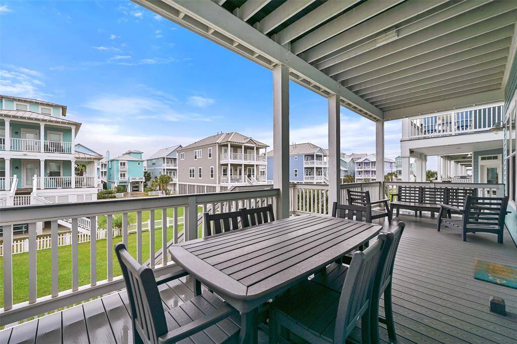 Relax and enjoy the island life on your front patio on the main floor.
