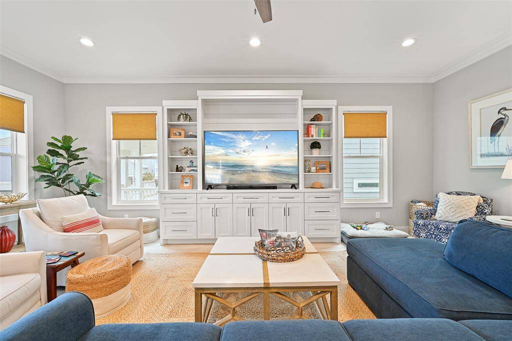There is plenty of space for everyone in this home that sleeps 14-16 people. The well appointed designer living room is turn key and ready to go. The custom-made cabinetry allows for ample storage as well as a clean-lined and modern aesthetic.