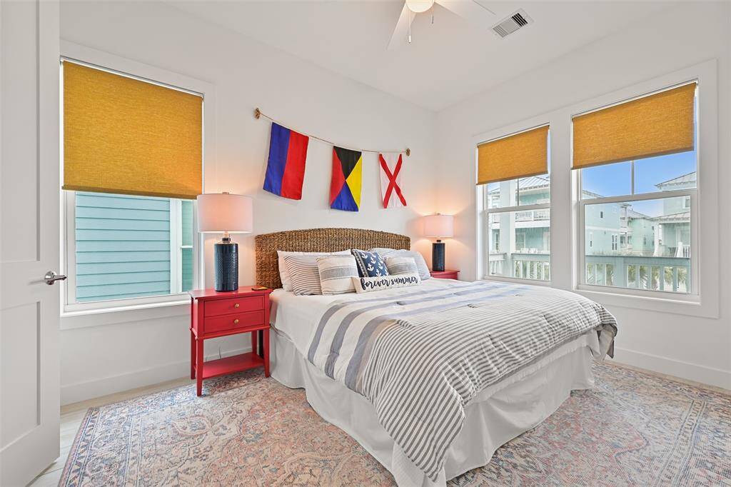 This Spacious bedrooms designed for relaxation and comfort located on the first floor (as secondary primary bedroom).  The room has a beautiful ensuite bathroom.