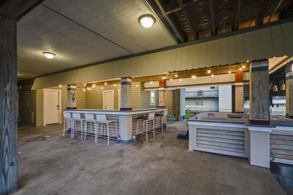 You are set up for fun in this incredible outdoor entertaining space.