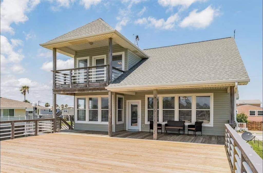 You have an expansive deck perfect for outdoor dining.