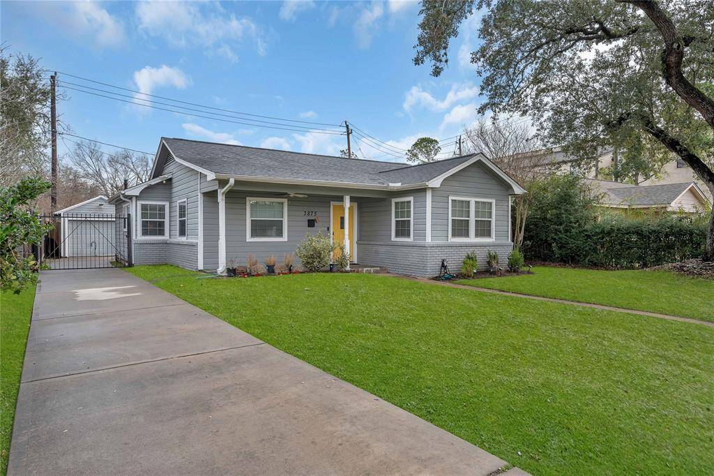 Wonderful curb appeal with a gated driveway.