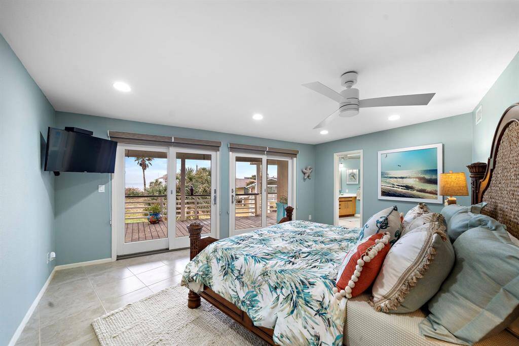 Breathtaking primary suite with direct access to the patio with amazing views.