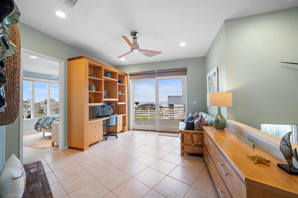 Another angle of the study/den/flex space with built in storage drawers.