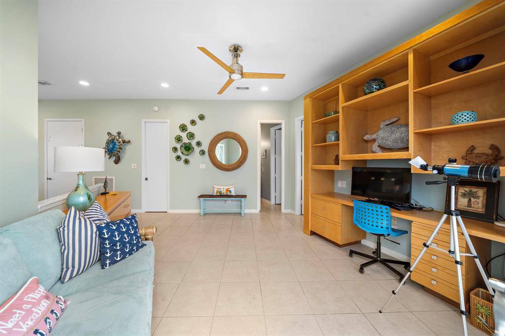 Door on left is the passenger elevator, the next door is a large walk in closet, and the next is the guest bathroom for the top floor. The guest bedroom is to the right (with en-suite access to the bathroom.)