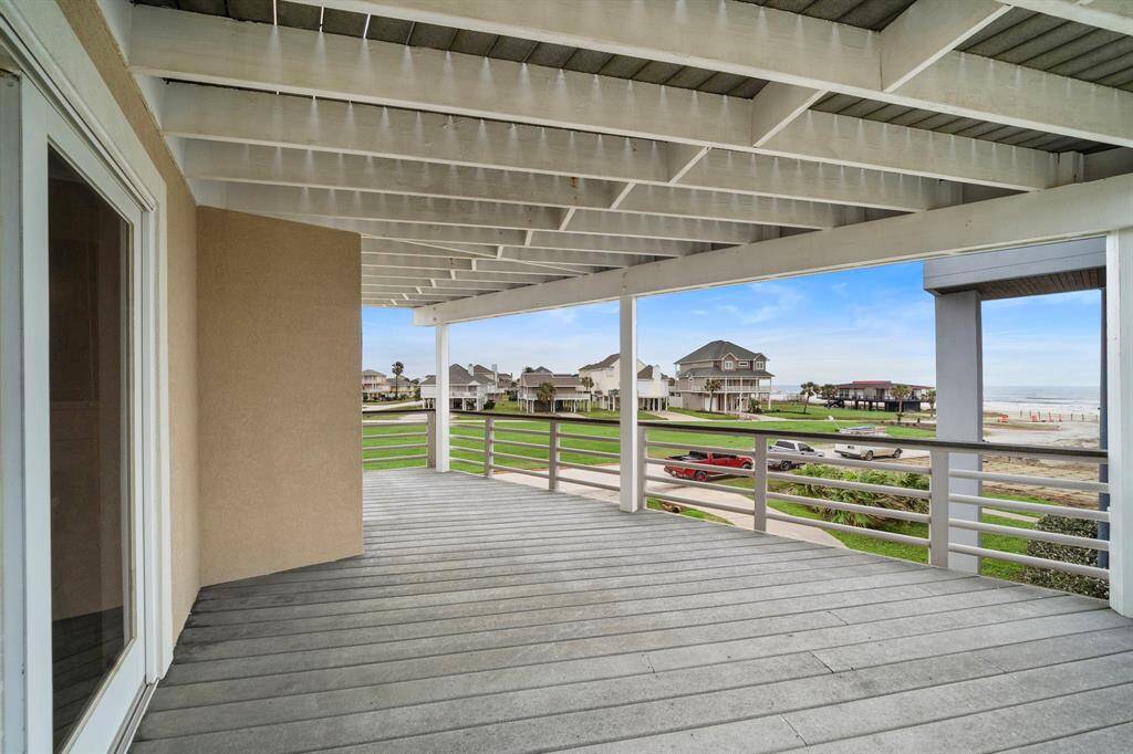 Expansive decking to enjoy the views and ocean breezes.  Just steps to the beach!
