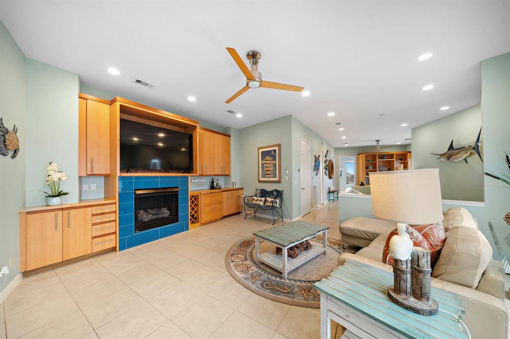 Custom cabinetry includes two Subzero refrigerator drawers.