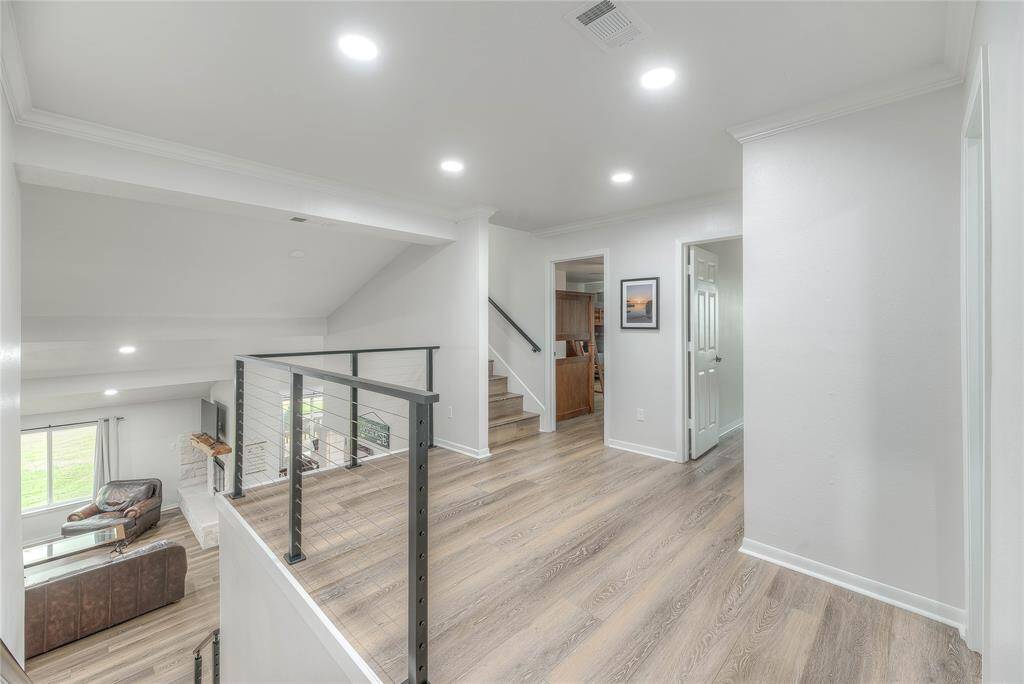 Beautiful wood plank flooring with new modern upgrades recently done.
