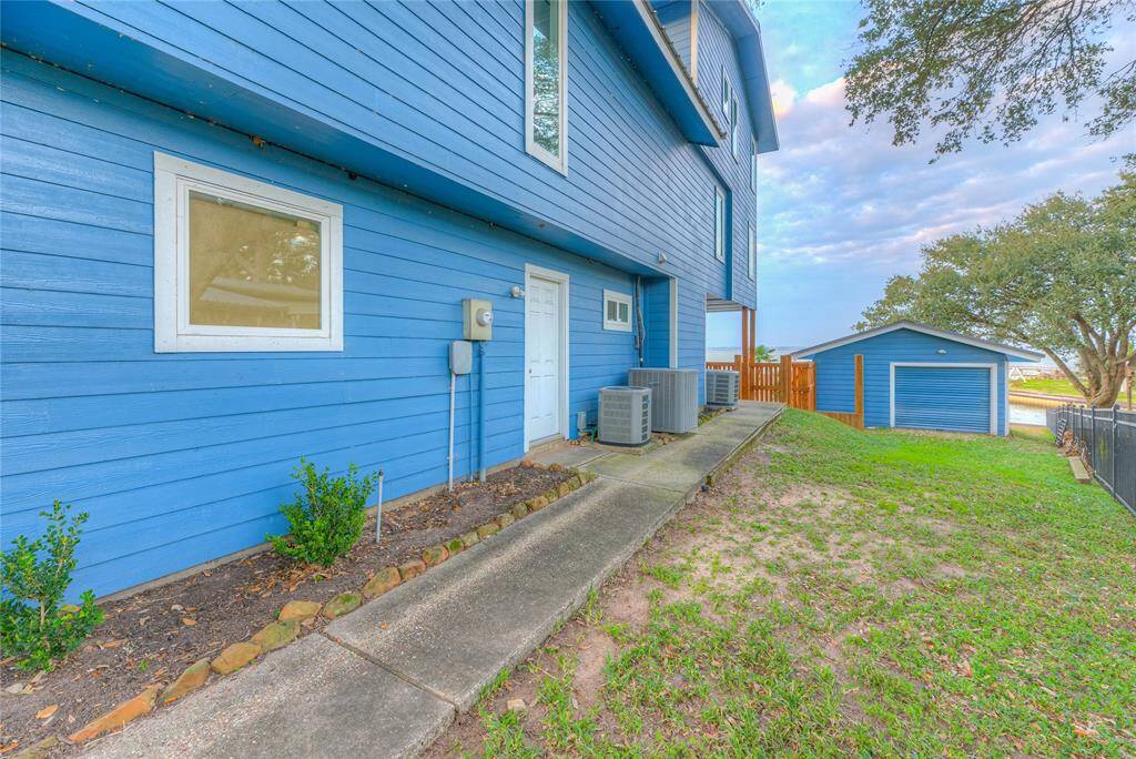 Small storage on back side of pool/guest house.