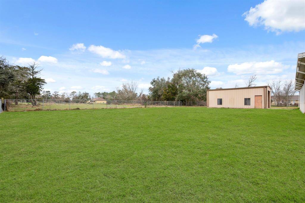 Enjoy the large, fenced backyard.