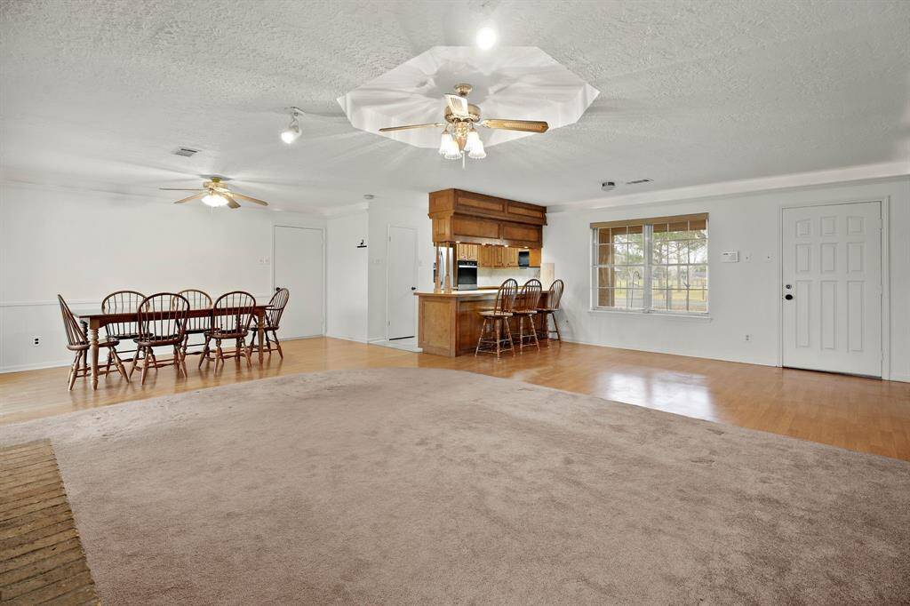 The family, dining and kitchen are all together, so you never miss out on family time.