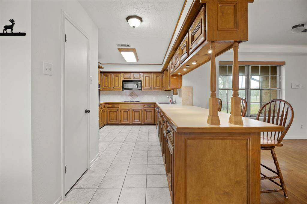 Kitchen with classic wooden cabinetry