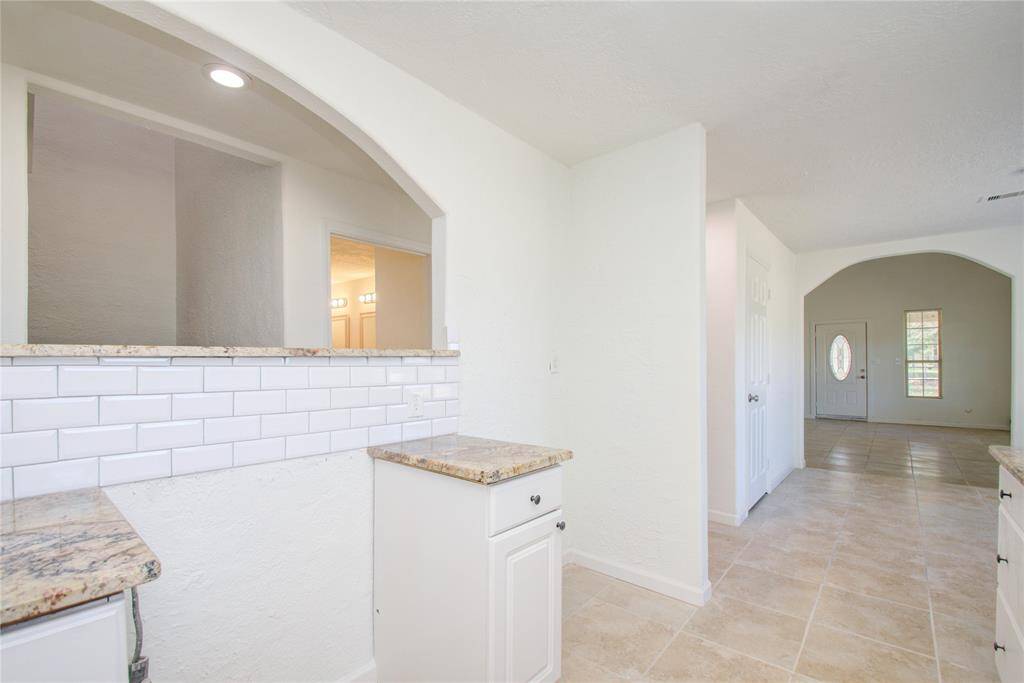 Kitchen DOES include Oven and Stove Top