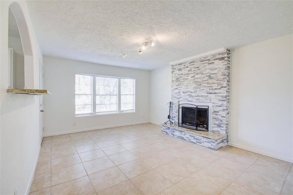 Secondary living room with new modern fireplace