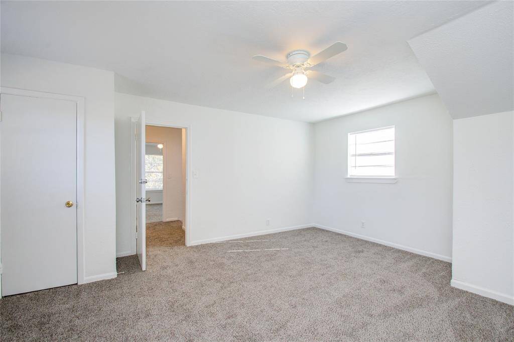 One of the 2 large secondary bedrooms upstairs.