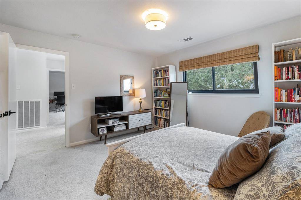 The large,secondary bedroom on the second floor gives your guests their own suite