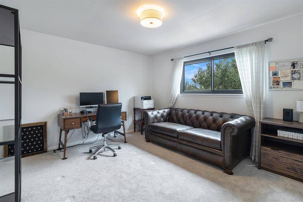 The third bedroom is currently being used as a office.