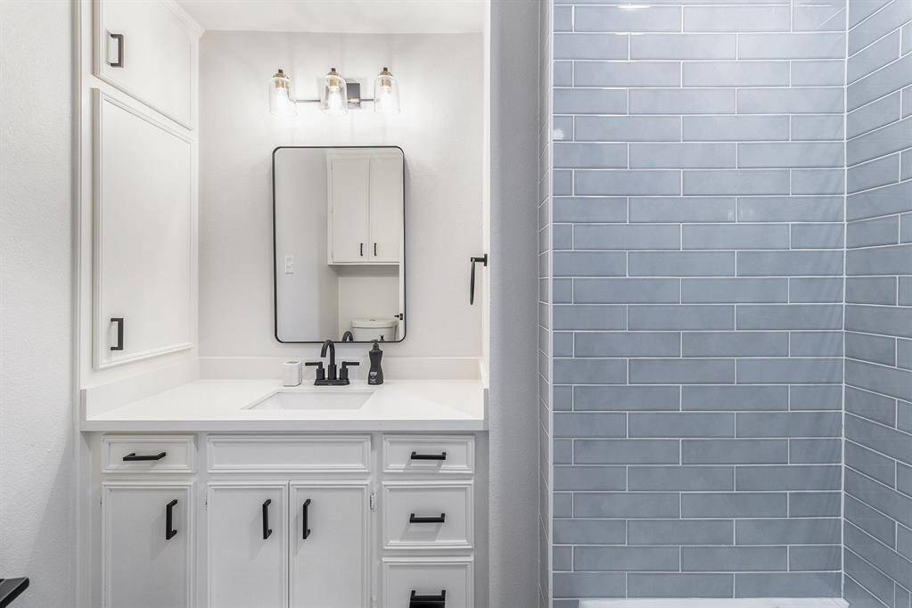 Bathroom for the last bedroom features a shower/tub combo.