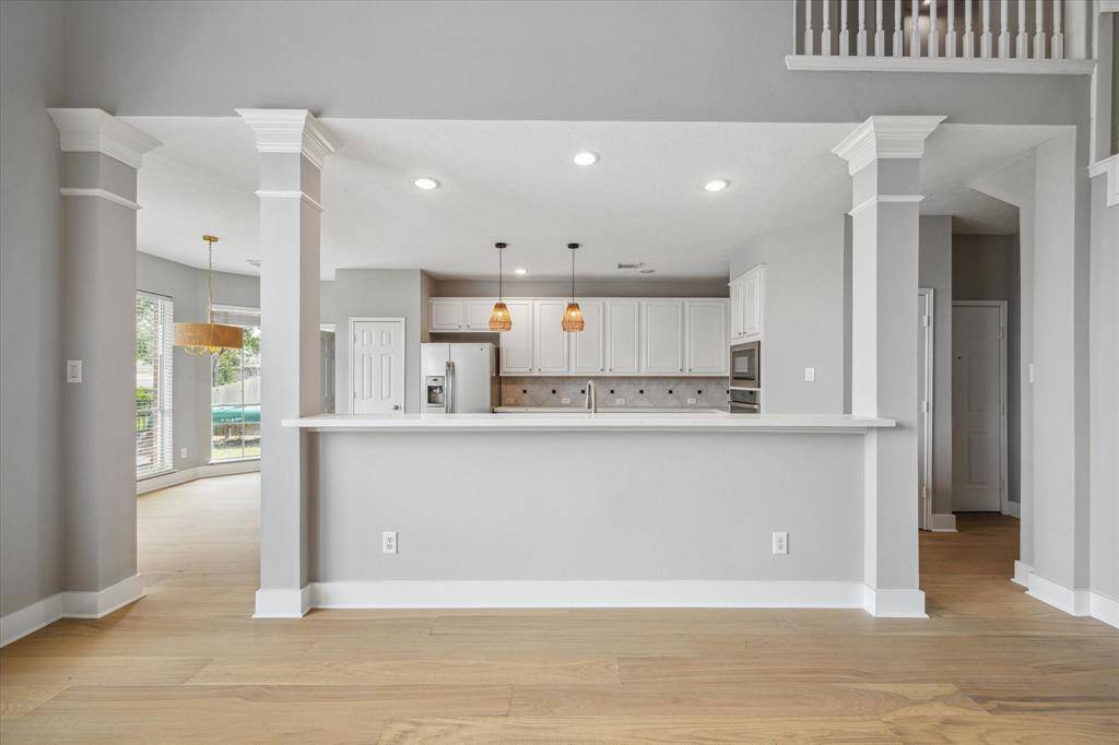 Modern kitchen featuring a stylish breakfast bar, perfect for casual dining and entertaining family and friends.