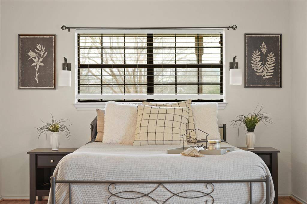 Oversized primary with loads of space and natural light.