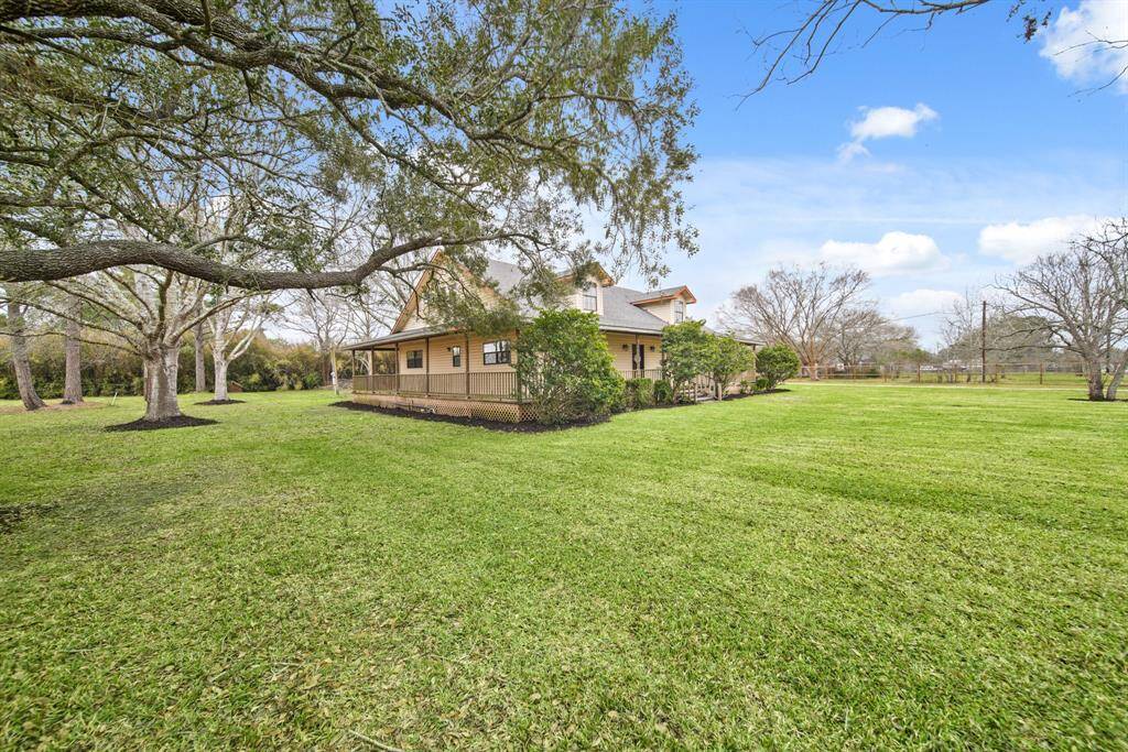 Enjoy the country feel on your own private 1 acre unrestricted corner lot