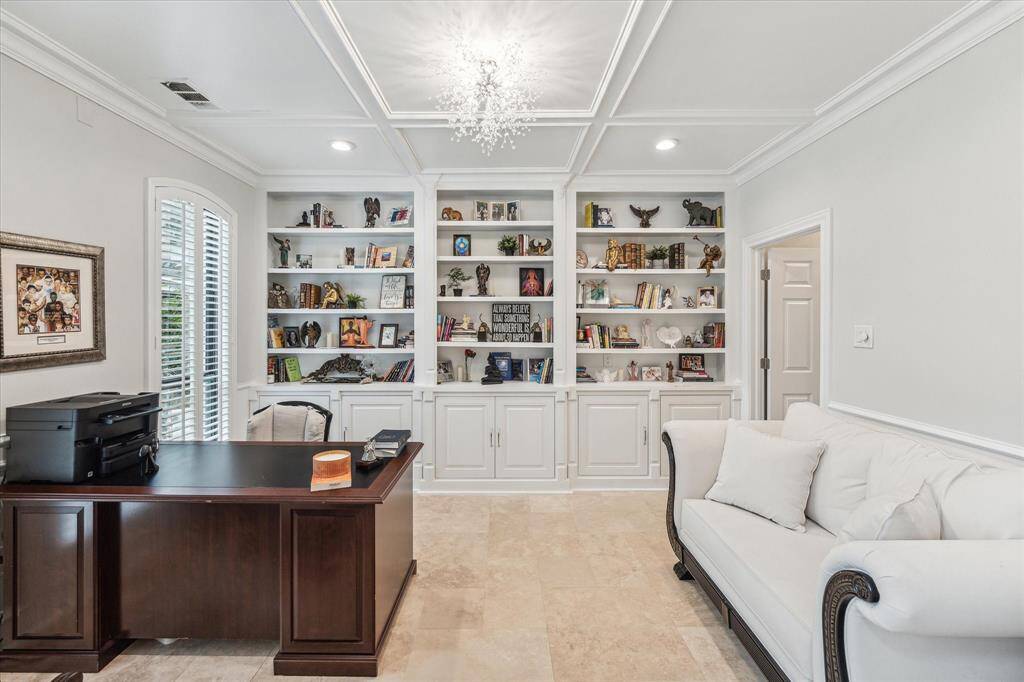STUDY- Home office with front yard views and lots of storage.