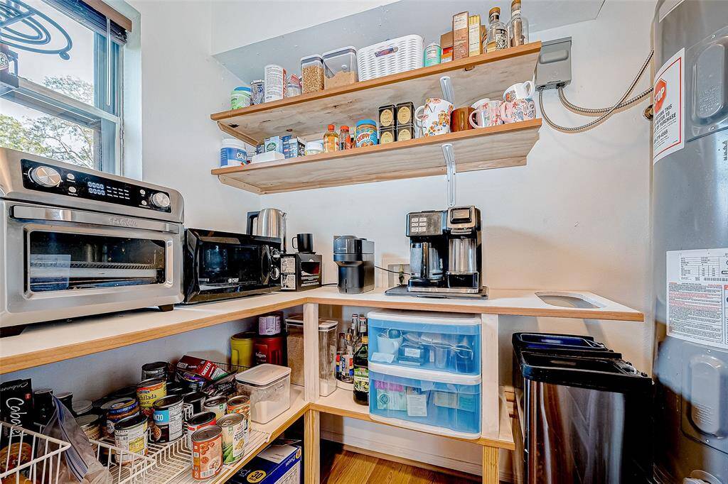 The walk-in pantry is practical and efficiently arranged for easy access to kitchen essentials